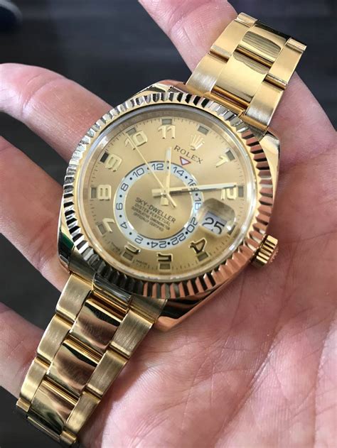 rolex sky dweller yellow gold champagne dial